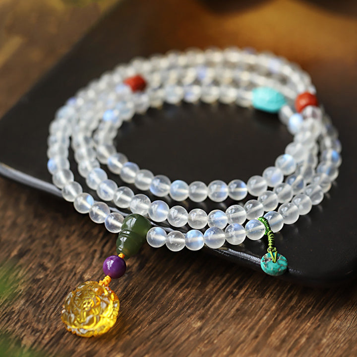 Buddha Stones ​​108 Mala-Perlen Mondstein Bernstein Lotus Türkis Kristallheilungsarmband - Mondstein (Leuchtkraft variiert – dezent bis stark) - image 0