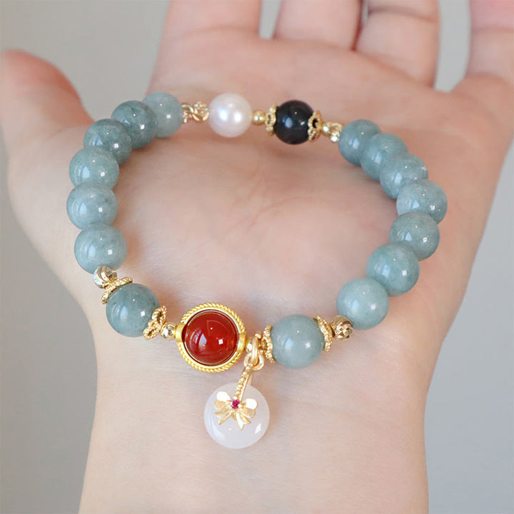 Buddha Stones Armband mit Fliege und Glücksbringer, Naturjade, roter Achat, Perlen