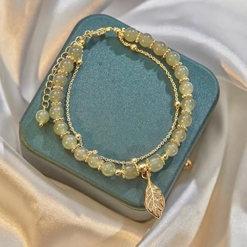 Perlenarmband mit Buddha Stonesn, Jadeblatt, Ginkgo-Tulpe, Erdnuss-Fu-Charakter, Glücksperlen - image 1