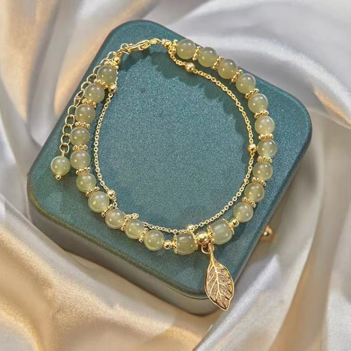 Perlenarmband mit Buddha Stonesn, Jadeblatt, Ginkgo-Tulpe, Erdnuss-Fu-Charakter, Glücksperlen - image 1