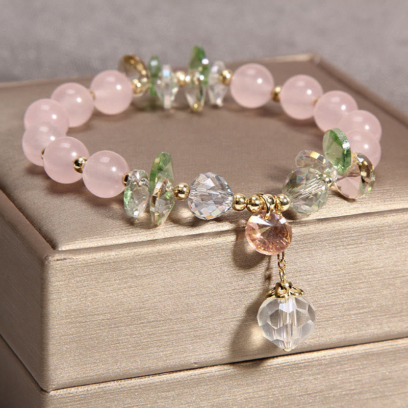 Buddha Stones Katzenauge rosa Kristall-Friedens-Charm-Armband