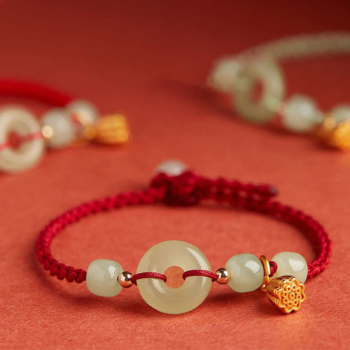 Buddha Stones Rundes Friedensarmband mit Jade-Lotus-Motiv, Symbol für Glück, Fülle und Reichtum - image 1