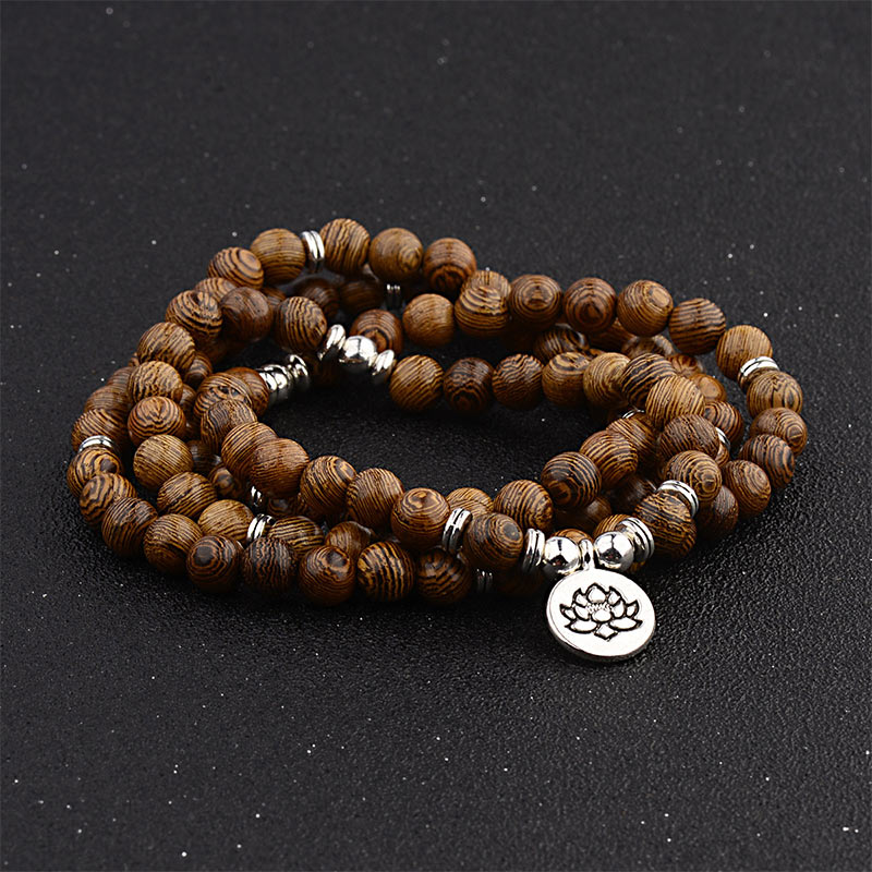 Buddha Stones, tibetisches Holzarmband, Lotus-Charm-Mala - image 1