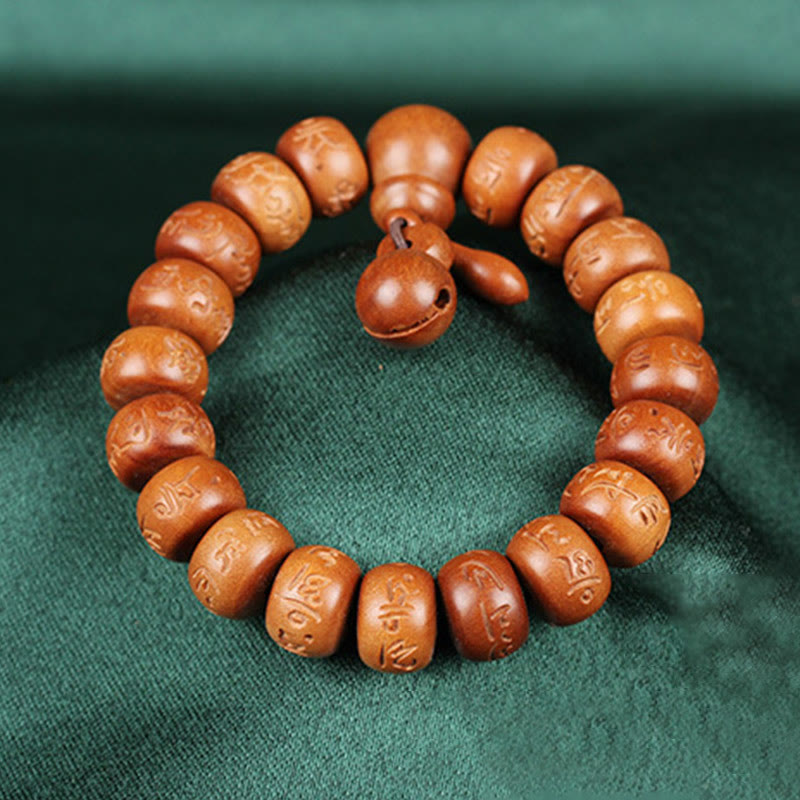 Buddha Stones Armband aus natürlichem tibetischem Pfirsichholz mit Om Mani Padme Hum-Gravur zur Abwehr böser Geister