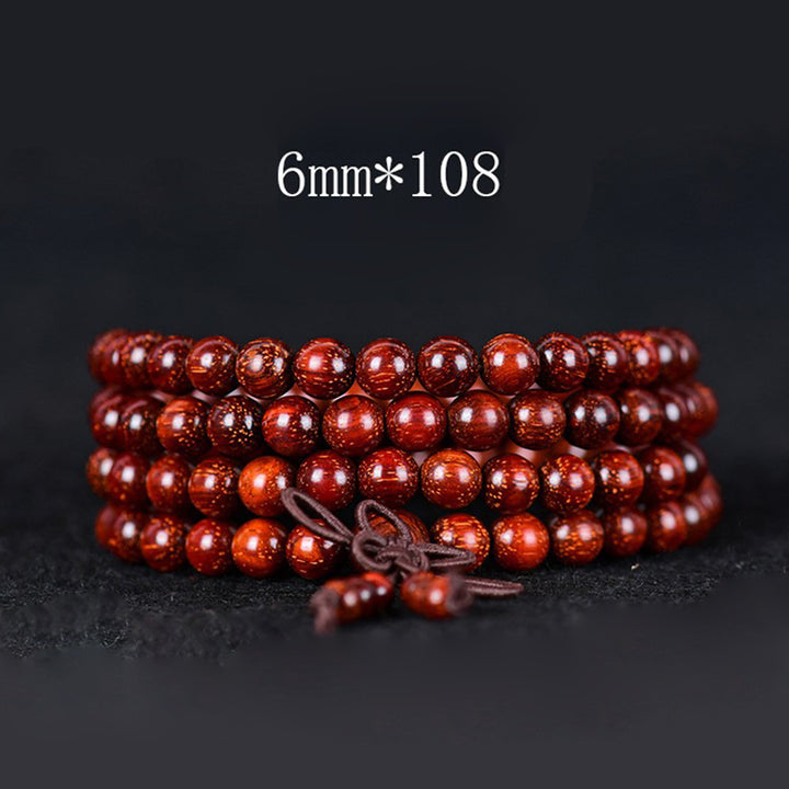 Buddha Stones Tibetisches kleines Blatt-Balance-Armband aus rotem Sandelholz