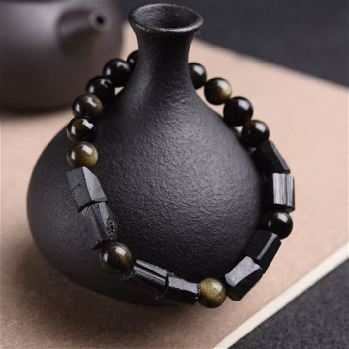 Buddha Stones Reichtumsarmband mit Obsidian und schwarzem Turmalin in Goldglanz