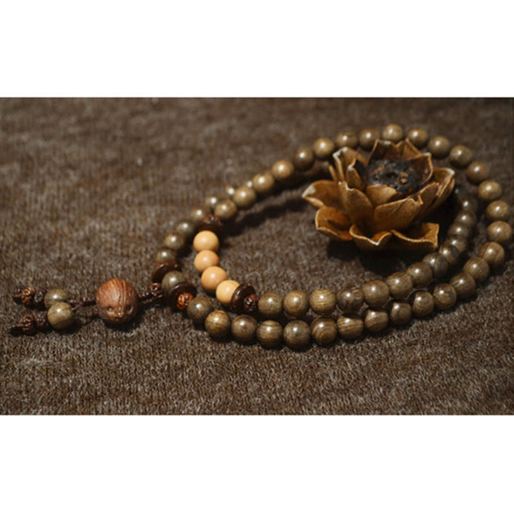 Buddha Stones Mala-Armband aus tibetischem Sandelholz mit Schutzamulett - image 5