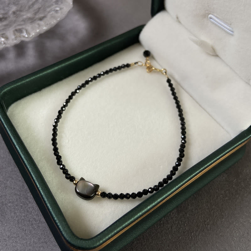 Buddha Stones 14K vergoldetes schwarzes Spinell- Weiß Kristall-Heilarmband mit süßer Katze aus Tridacna-Stein - image 2