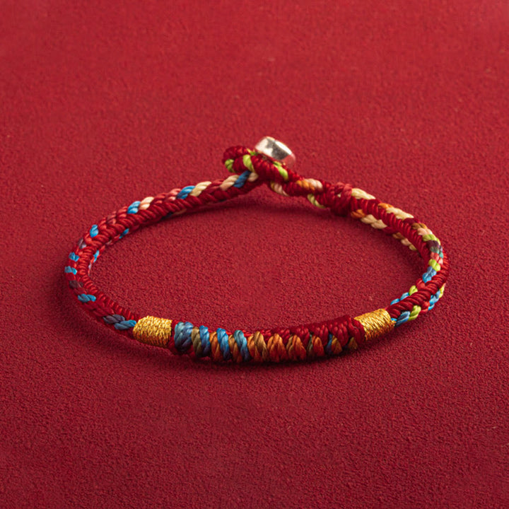 Mehrfarbiges Armband mit Buddha Stonesn „Mögest du im kommenden Jahr sicher und glücklich sein“. - image 1