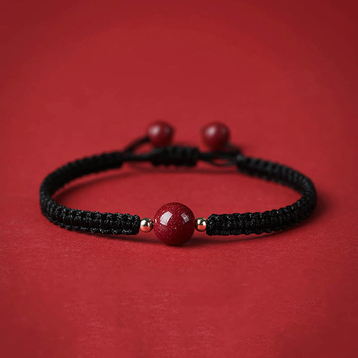 Buddha Stones Glücksbringer-Armband mit Zinnober-Perlen und roter Schnur