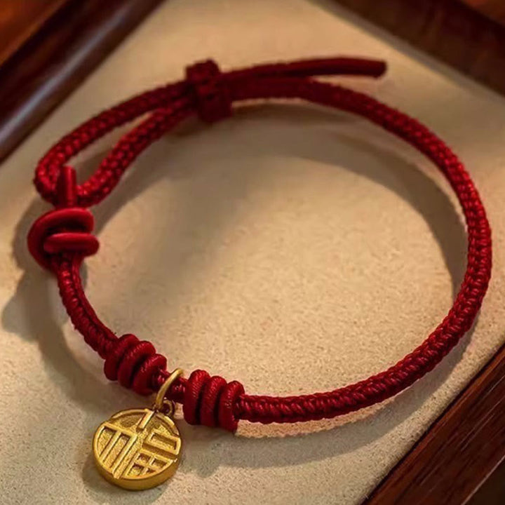 Buddha Stones Handgefertigtes Armband aus rotem Seil mit acht Fäden, Friedensknoten und Fu-Zeichen-Anhänger – ein Symbol für Glück und Freude - 17-20 cm - image 0