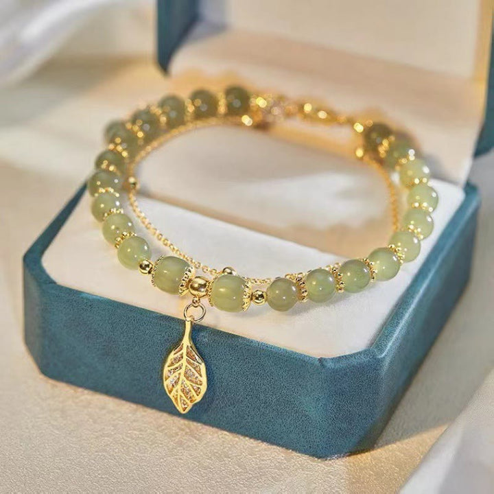 Perlenarmband mit Buddha Stonesn, Jadeblatt, Ginkgo-Tulpe, Erdnuss-Fu-Charakter, Glücksperlen - Goldenes Blatt & Jade - image 0