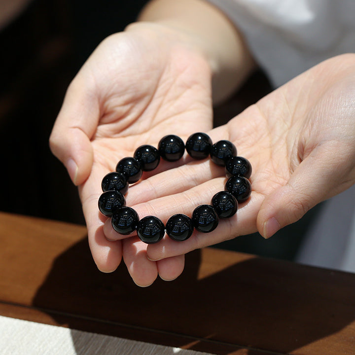 Glücksarmband aus natürlichem schwarzen Onyx von Buddha Stones