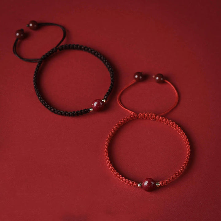 Buddha Stones Glücksbringer-Armband mit Zinnober-Perlen und roter Schnur