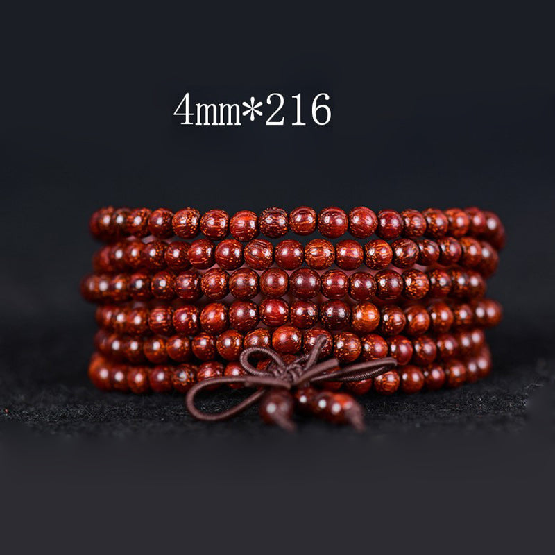Buddha Stones Tibetisches kleines Blatt-Balance-Armband aus rotem Sandelholz