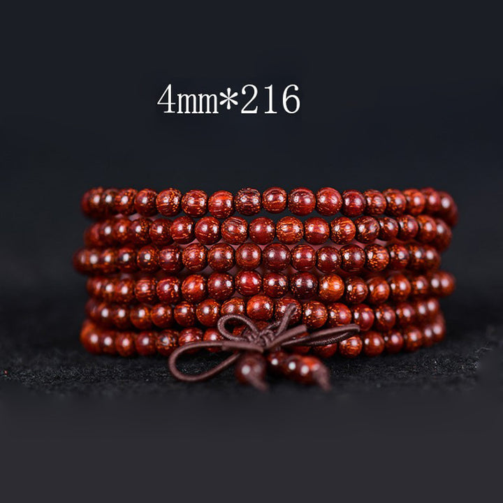 Buddha Stones Tibetisches kleines Blatt-Balance-Armband aus rotem Sandelholz