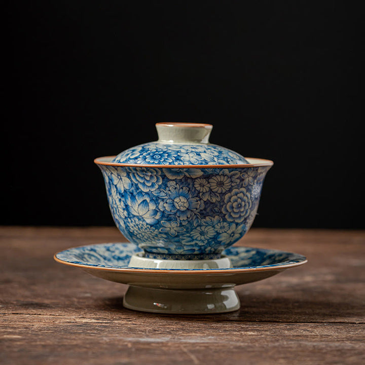 Buddha Stones Vintage Blaues und Weiß Porzellan Pfirsichblüte Lotus Pfingstrose Keramik Gaiwan Sancai Teetasse Kung Fu Teetasse und Untertasse mit Deckel - image 1
