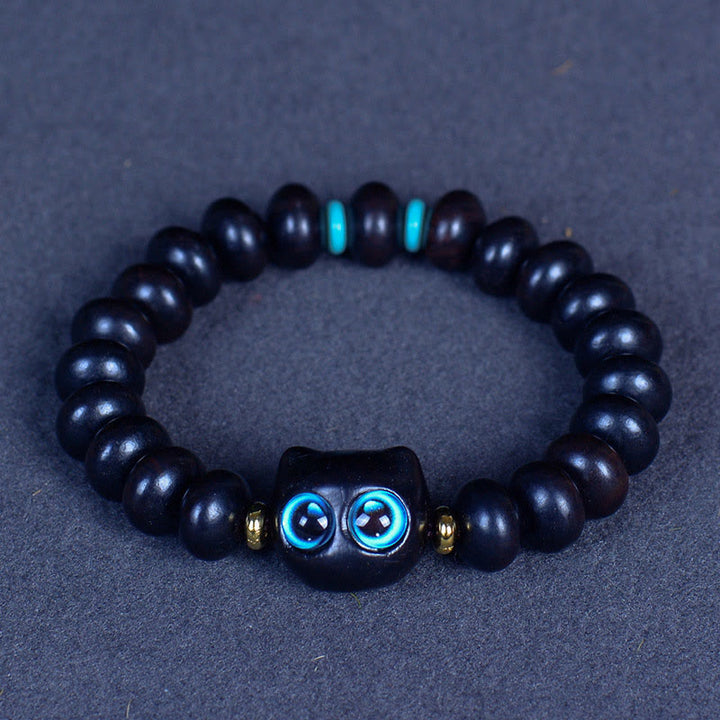 Buddha Stones, Ebenholz, Liuli-Glas, hübsches Katzen-Peace-Balance-Armband - Ebenholz 7 x 10 mm x 21 Perlen (Handgelenkumfang 14–16 cm) - image 1