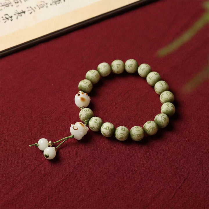 Buddha Stones, grüner Bodhi-Samen, Katzenpfote, Om Mani Padme Hum, graviertes Weisheitsarmband - Bodhi-Samen (Glücksverheißung ♥ Glück) - image 1