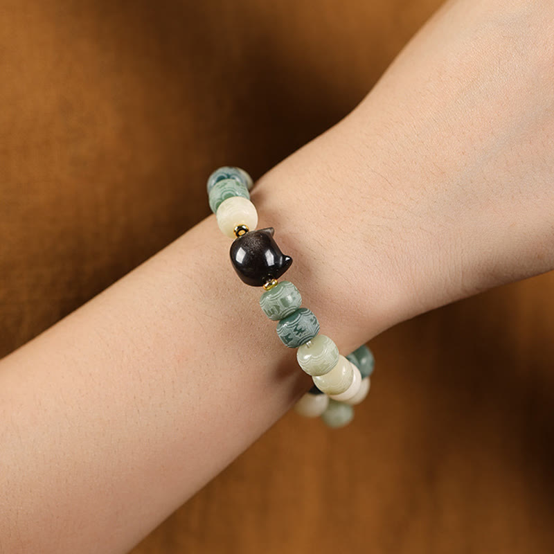 Buddha Stones Bodhi Seed Silber glänzendes Obsidian-Katzenkopf-Armband mit Om Mani Padme Hum-Gravur für Harmonie - image 12