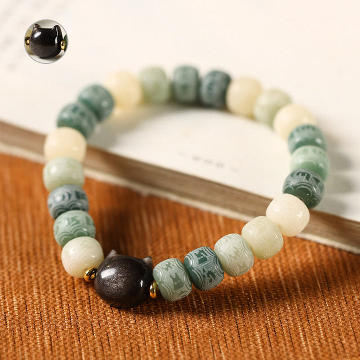 Buddha Stones Bodhi Seed Silber glänzendes Obsidian-Katzenkopf-Armband mit Om Mani Padme Hum-Gravur für Harmonie - image 9