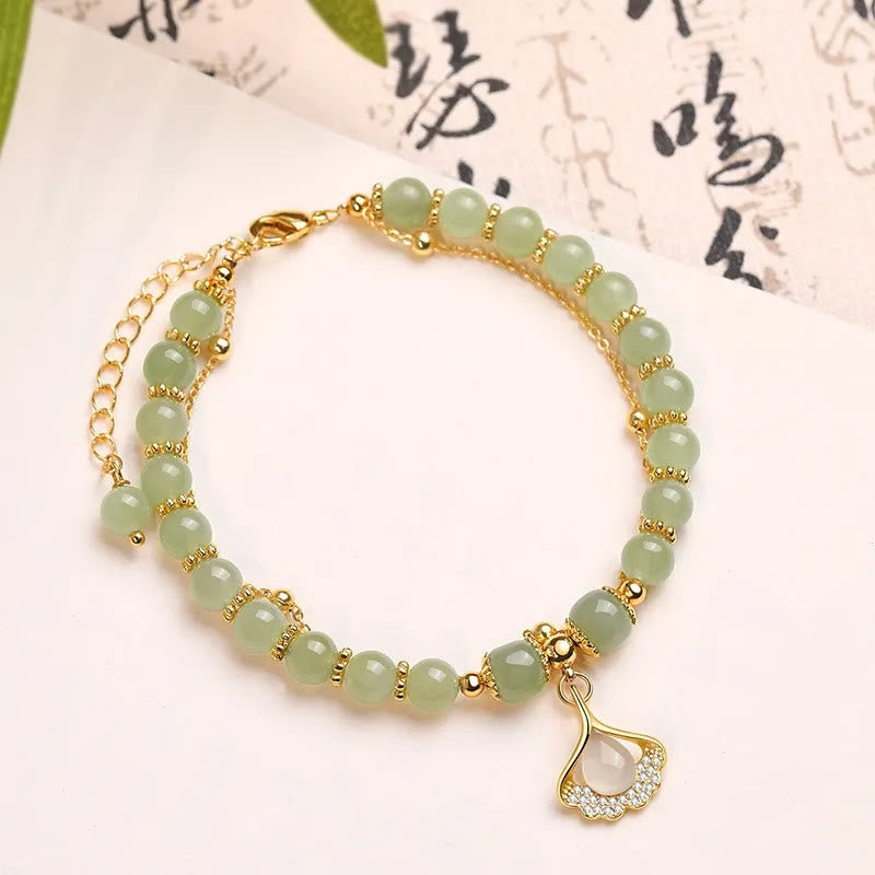 Perlenarmband mit Buddha Stonesn, Jadeblatt, Ginkgo-Tulpe, Erdnuss-Fu-Charakter, Glücksperlen