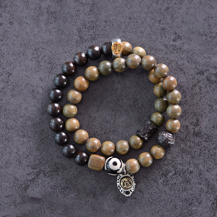 Buddha Stones, tibetisches grünes Sandelholz, Ebenholz, dreiäugiges Dzi-Perlen-Fu-Charakter-Balance-Friedens-Doppelwickelarmband