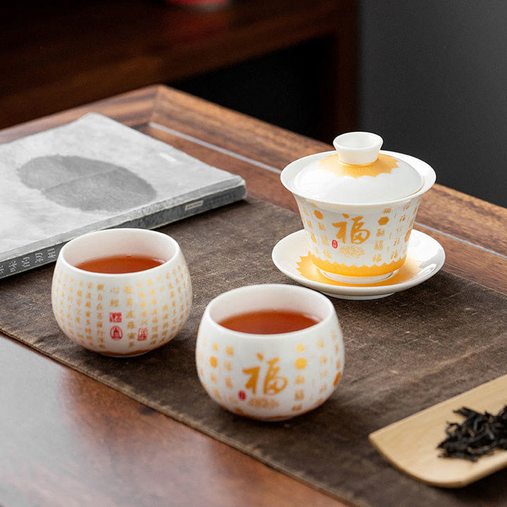 Buddha-Steine, buddhistisches Herz-Sutra, kleine Fu-Figur, Keramik-Gaiwan-Teetasse, Kung-Fu-Teetasse und Untertasse mit Deckel