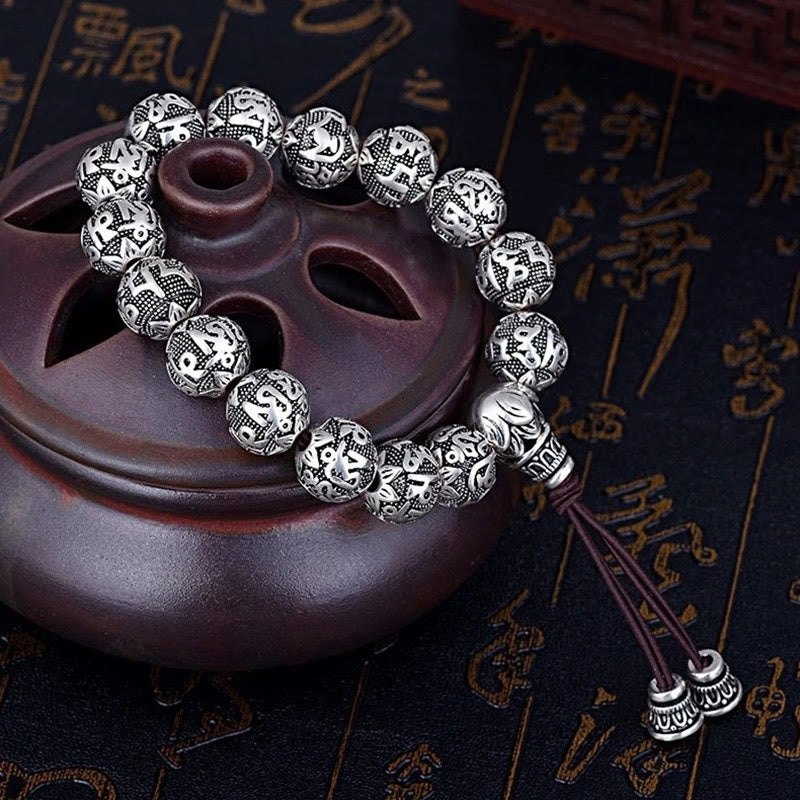 Buddha Stones Tibetisches Om Mani Padme Hum Amulett-Armband mit geschnitzten Legierungsperlen