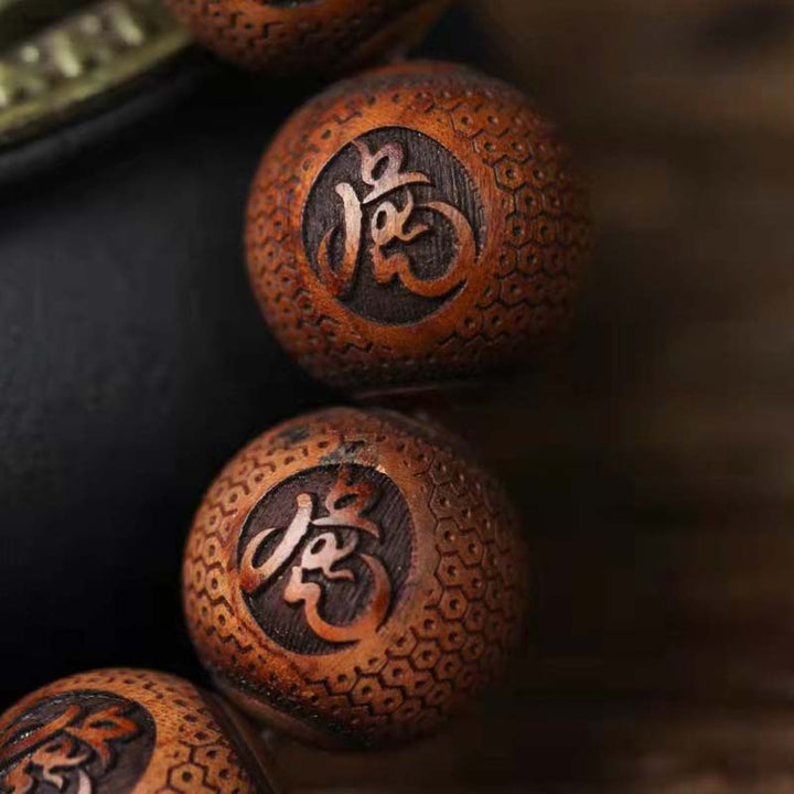 Buddha Stones Tibetisches Palisander-Gravur-Tigerschutzarmband