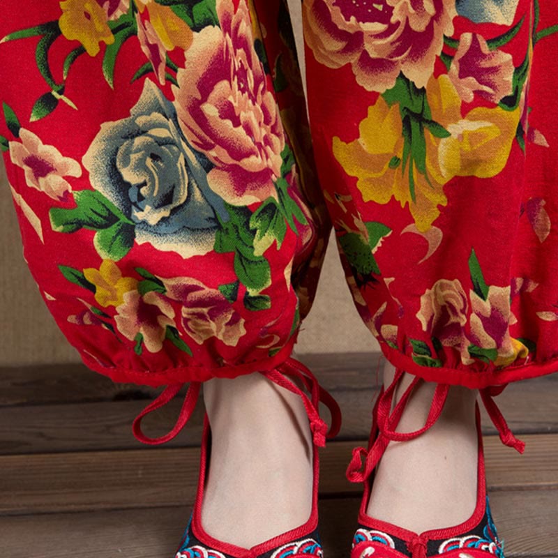 Haremshose mit Taschen im Ethno-Stil mit Buddha-Steinen, Rot/Grün/Blumen-Print