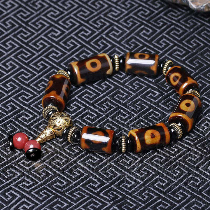 Buddha Stones Tibetisches Neun-Augen-Dzi-Perlen-Glücks-Charm-Armband