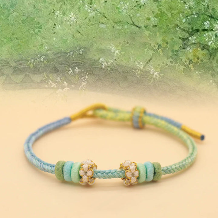 Buddha Stones Handgefertigtes achtfädiges Friedensknoten-Pfirsichblütenknoten-Glücksseil-geflochtenes Armband - Frühling voller Gärten (Blaugrün) (Handgelenkumfang 14–18 cm) - image 4