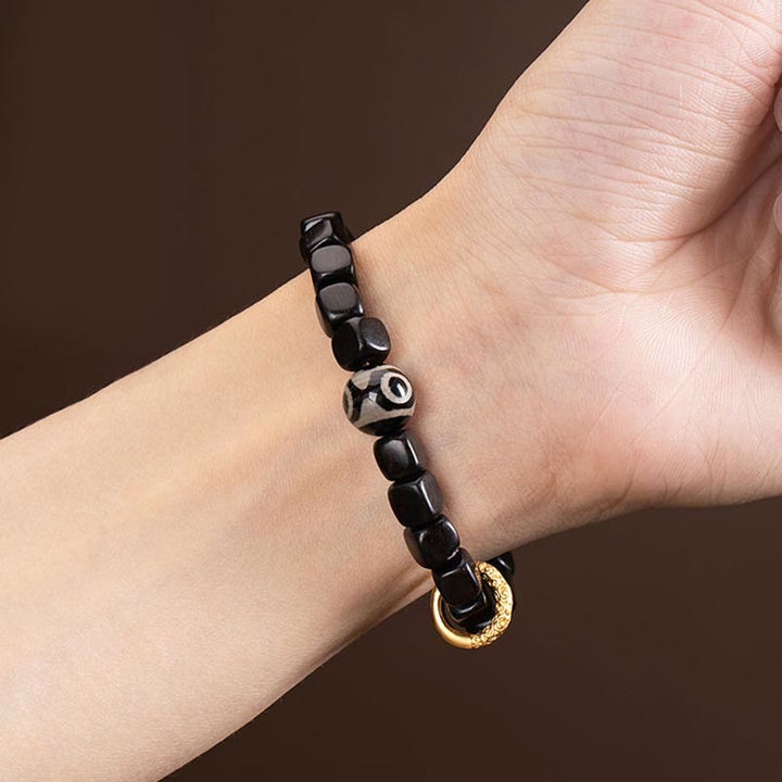 Armband mit Dzi-Perlen aus tibetischem Ebenholz und Buddha-Steine, für Gleichgewicht und Ruhe