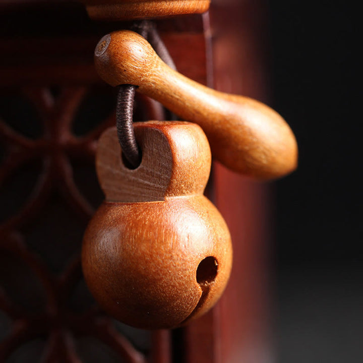 Buddha Stones Armband aus natürlichem tibetischem Pfirsichholz mit Om Mani Padme Hum-Gravur zur Abwehr böser Geister