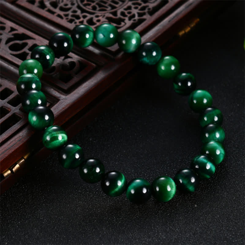 Buddha Stones natürliches grünes Tigerauge-Stärke-Armband - image 1
