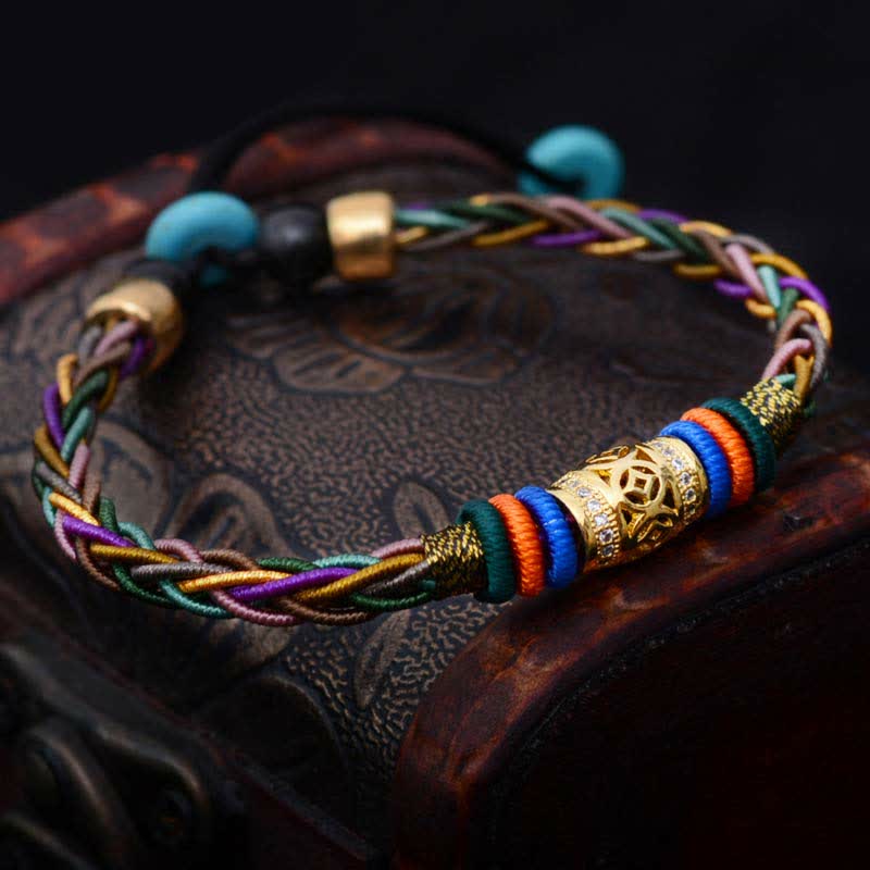 Buddha Stones, tibetisches handgefertigtes Acht-Faden-Knoten-Kupfer-Münzen-Glücks-Gewebe-Schnur-Armband - image 1