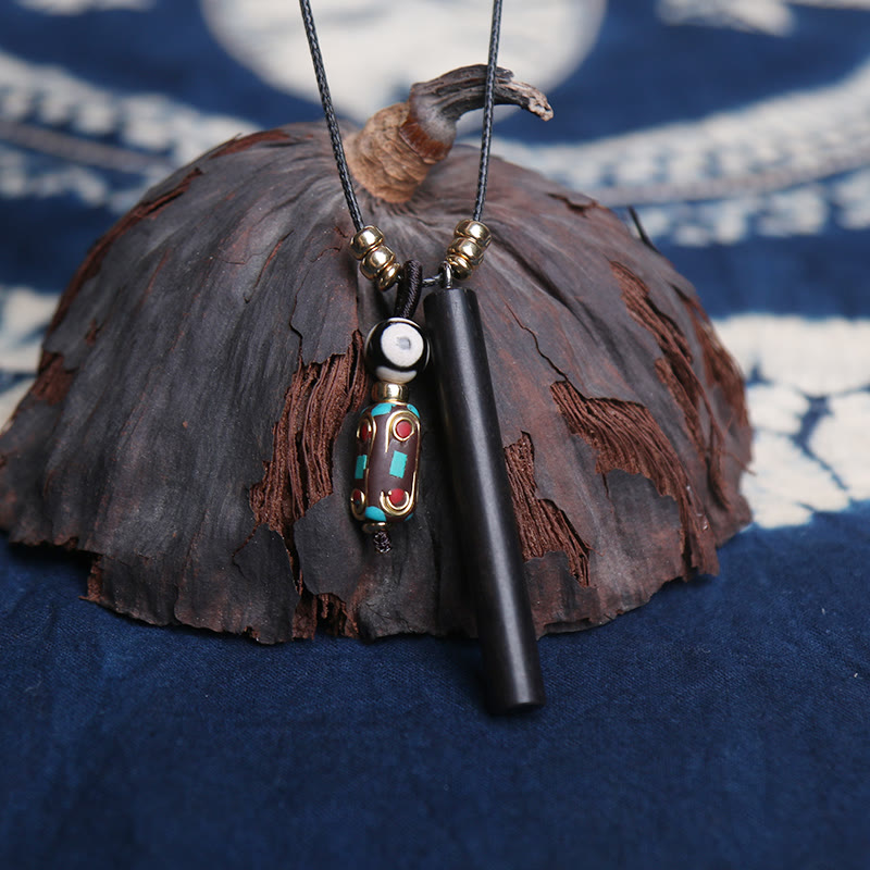 Tibetischer Ebenholz-Dzi-Perlen-Friedens-Ruhe-Halskettenanhänger - image 1