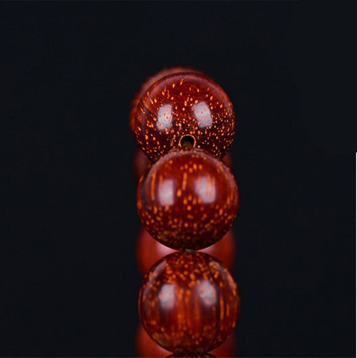 Buddha Stones Tibetisches kleines Blatt-Balance-Armband aus rotem Sandelholz