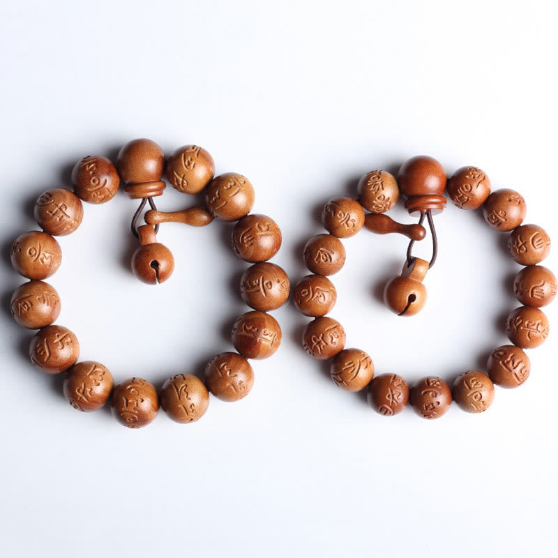 Buddha Stones Armband aus natürlichem tibetischem Pfirsichholz mit Om Mani Padme Hum-Gravur zur Abwehr böser Geister