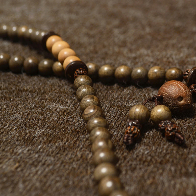 Buddha Stones Mala-Armband aus tibetischem Sandelholz mit Schutzamulett - image 13