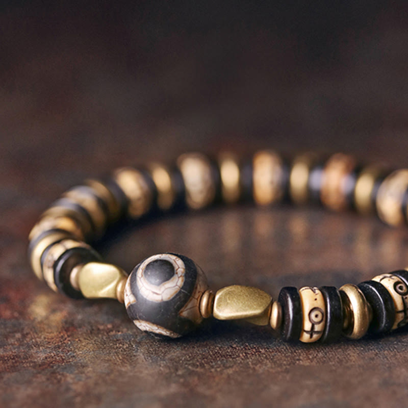 Buddha Stones Tibetische Knochenperlen Ebenholz Kraftarmband