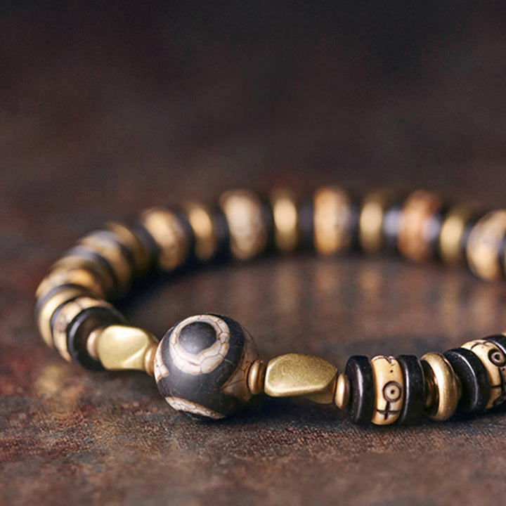 Buddha Stones Tibetische Knochenperlen Ebenholz Kraftarmband
