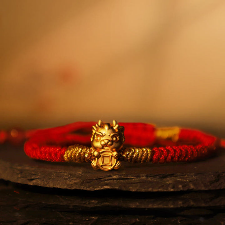 Buddha Stones, 999er-Sterlingsilber, Jahr des Drachen, Kupfermünze, Glück, Drache-Fu-Charakter, Glück, handgefertigtes geflochtenes Armband mit roter Schnur