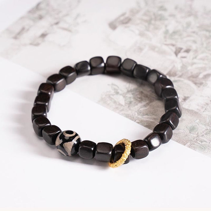 Armband mit Dzi-Perlen aus tibetischem Ebenholz und Buddha-Steine, für Gleichgewicht und Ruhe