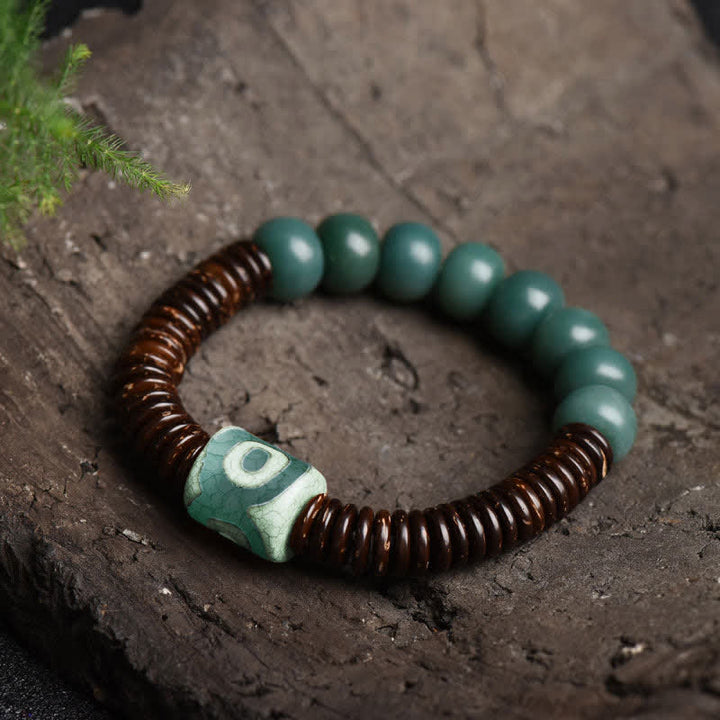 Tibetisches Cyan Bodhi Seed Dzi Perlen-Kokosnussschalen-Armband, das böse Geister fernhält