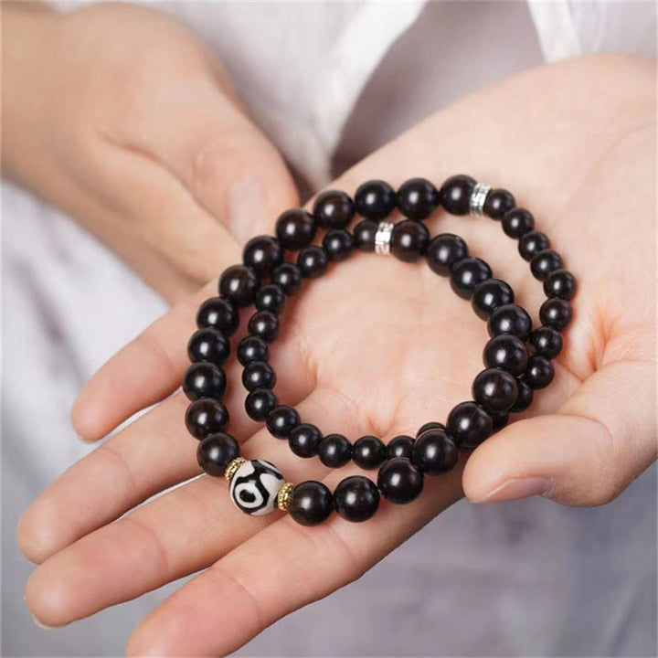 Buddha Stones Tibet Ebenholz Dzi Perlen Balance Doppelwickelarmband