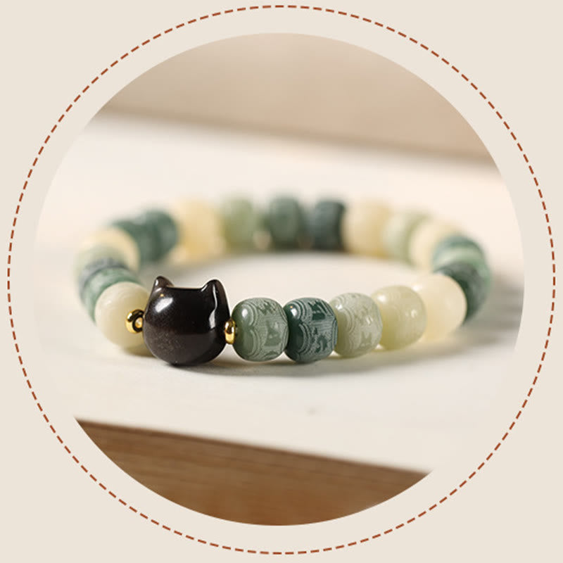 Buddha Stones Bodhi Seed Silber glänzendes Obsidian-Katzenkopf-Armband mit Om Mani Padme Hum-Gravur für Harmonie - image 13
