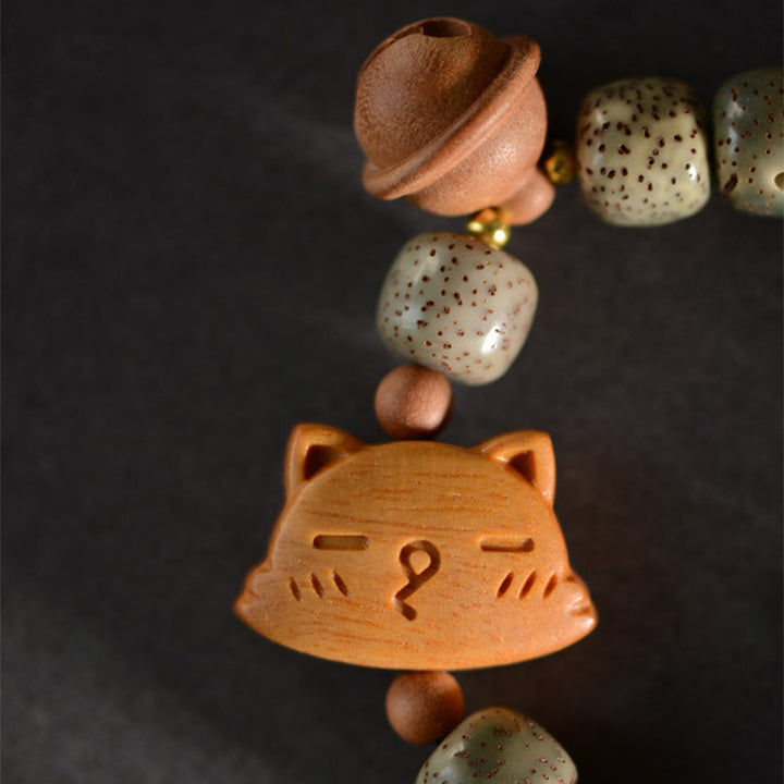 Buddha Stones Bodhi-Samen, Sandelholz-Katze, Pfirsichholz, Glocke, Peace Harmony