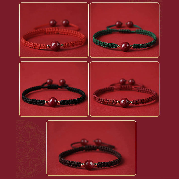 Buddha Stones Glücksbringer-Armband mit Zinnober-Perlen und roter Schnur